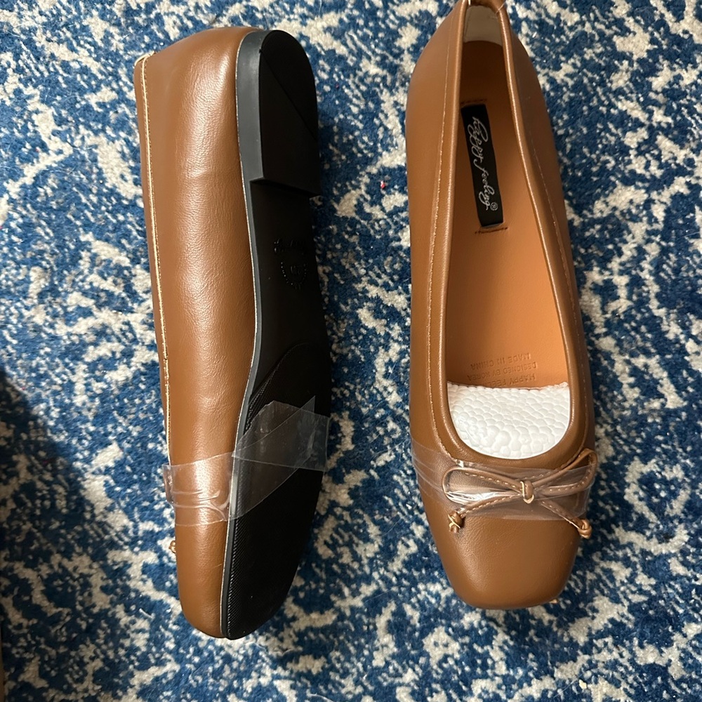 Never worn brown leather ballet flat